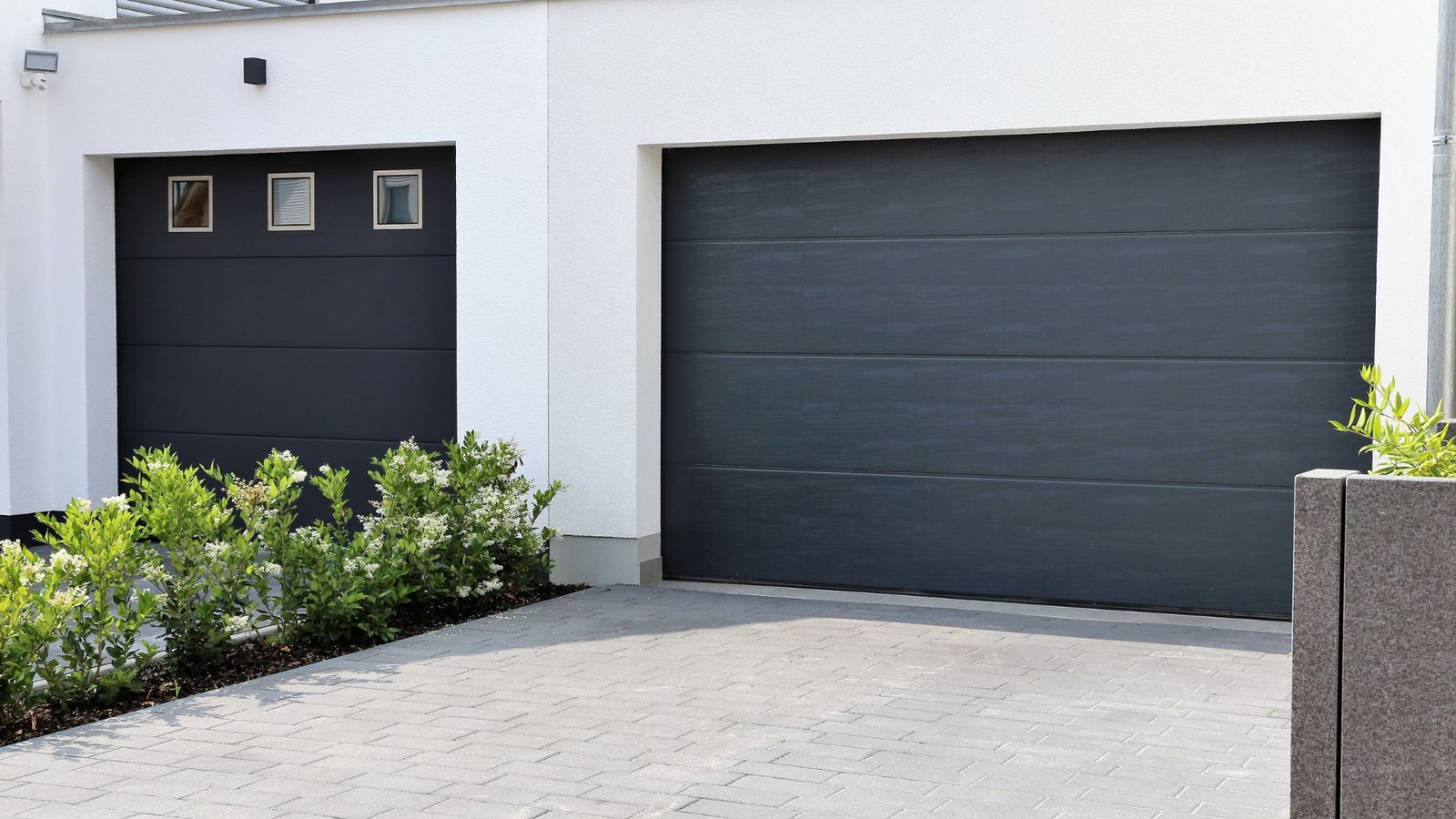 Does Insurance Cover Backing Into a Garage Door?