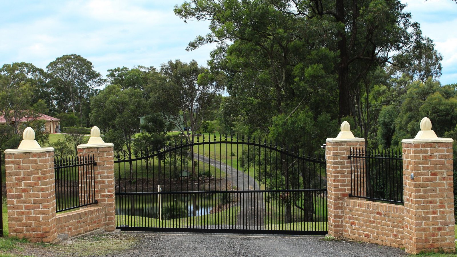 Should Driveway Gates Open In Or Out? What Homeowners Need To Know Before Choosing