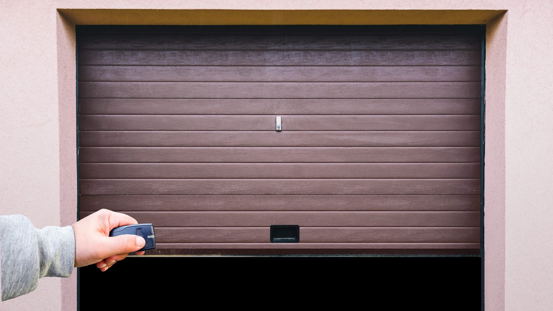 Your Garage Door Is Screeching Because Metal Is Grinding Bare Metal